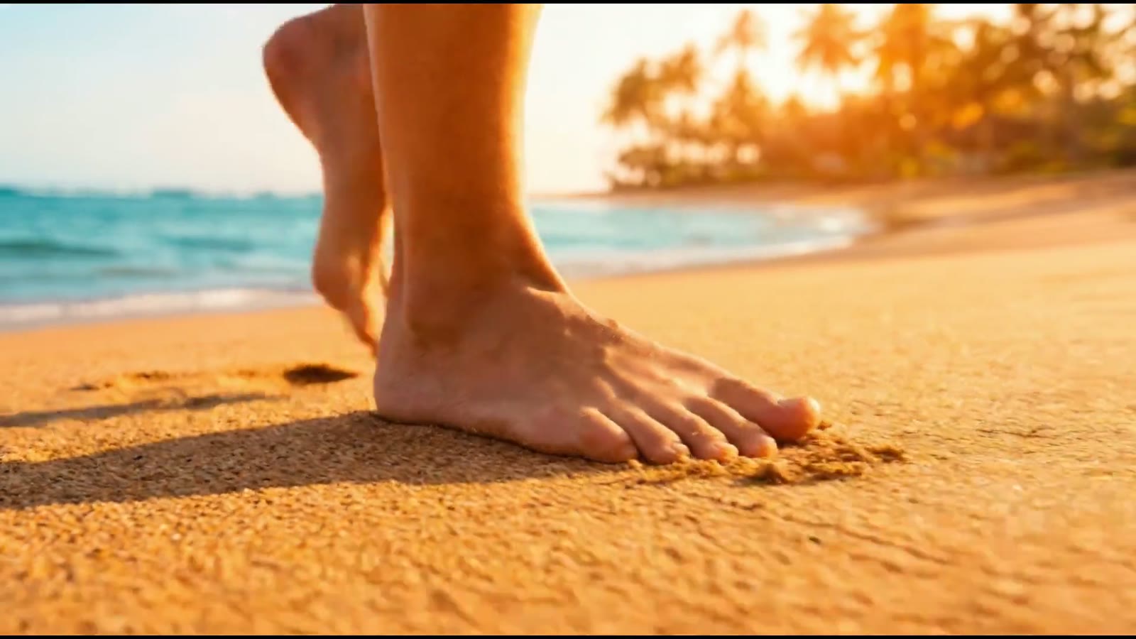 Pied nu dans le sable, plan de transition